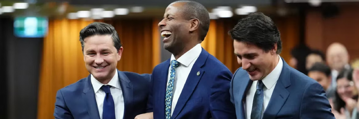 Canada's new Speaker of the House of Commons Greg Fergus escorted by Conservative Leader Pierre Poilievre and PM Justin Trudeau